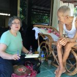 Katherine Bowie Interviewing Monk in Thailand